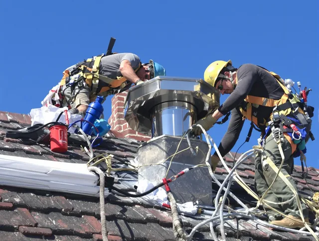 Protective chimney cap installed by Torrington Chimney Sweep in Torrington, CT